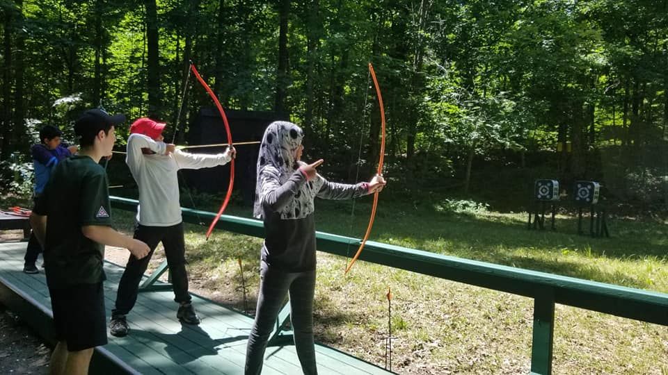youth partcipating in Archery